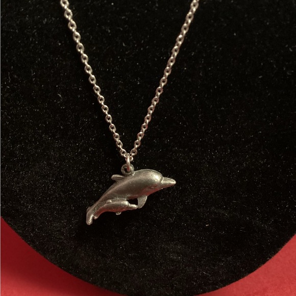 Silver tone gray dolphin pendant on a silver tone chain - Picture 2 of 5